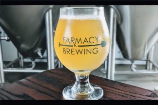 Farmacy Brewing glass with logo