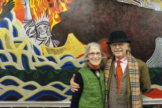 Drs. Zohara and Bob Hieronimus at their Apocalypse mural at Johns Hopkins University